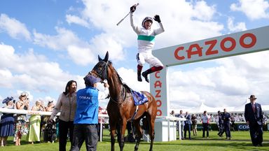 Frankie Dettori performs his famous flying dismount at Doncaster